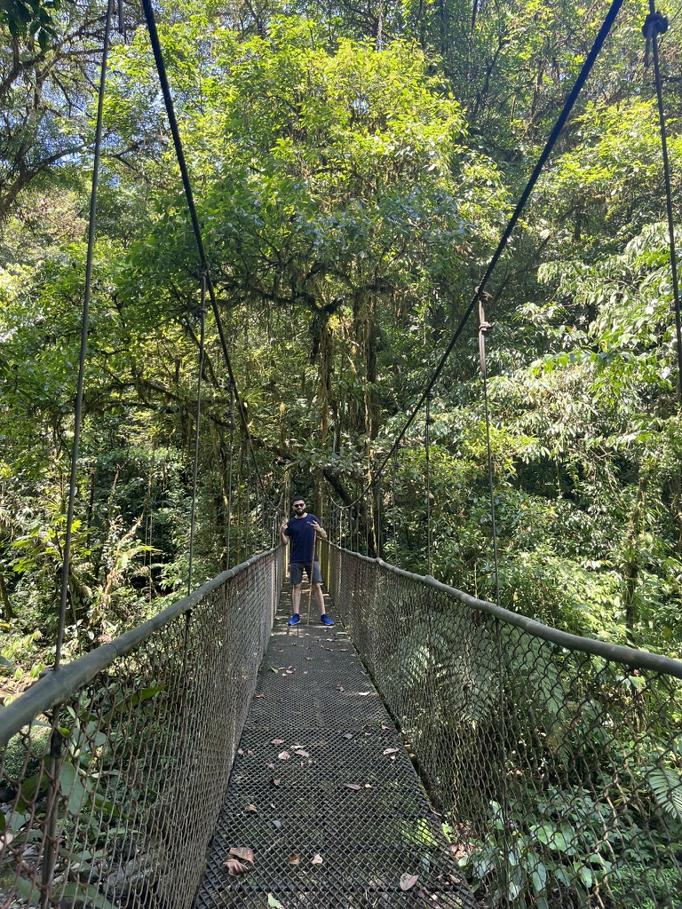 Geovanny Cordero Valverde on a forest bridge
